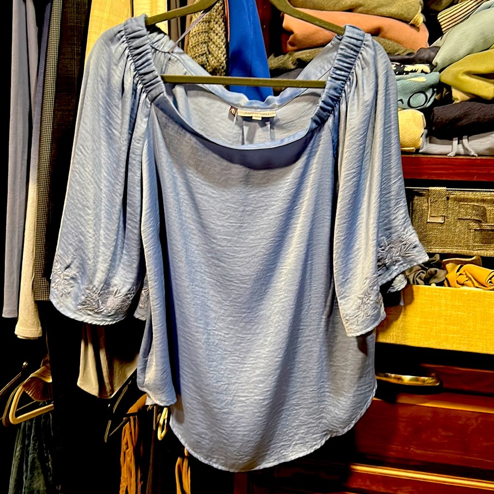 Jennifer Lopez cornflower blue satiny off the shoulder top
